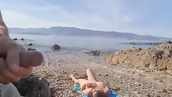 A Daring Man Reveals His Genitals To A Nudist Mature Woman Who Proceeds To Perform Oral Sex On Him At The Beach